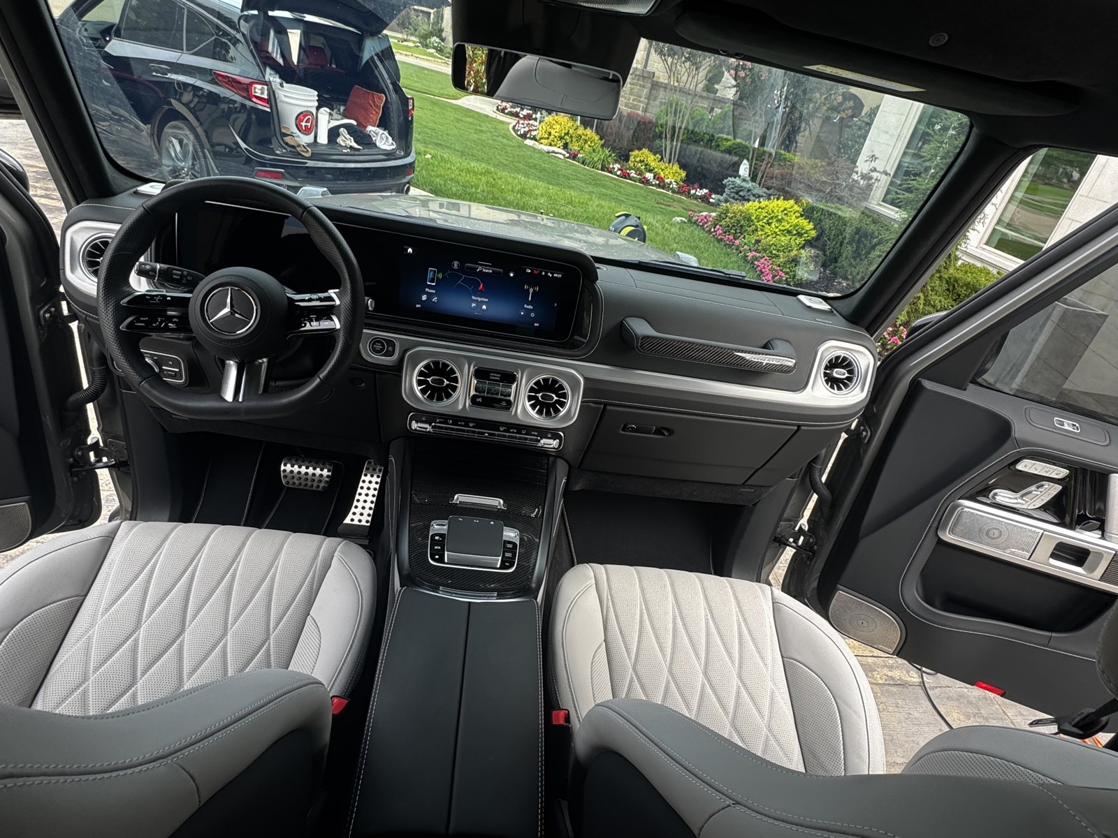 Mercedes G-Class dashboard and front seats after an interior detail