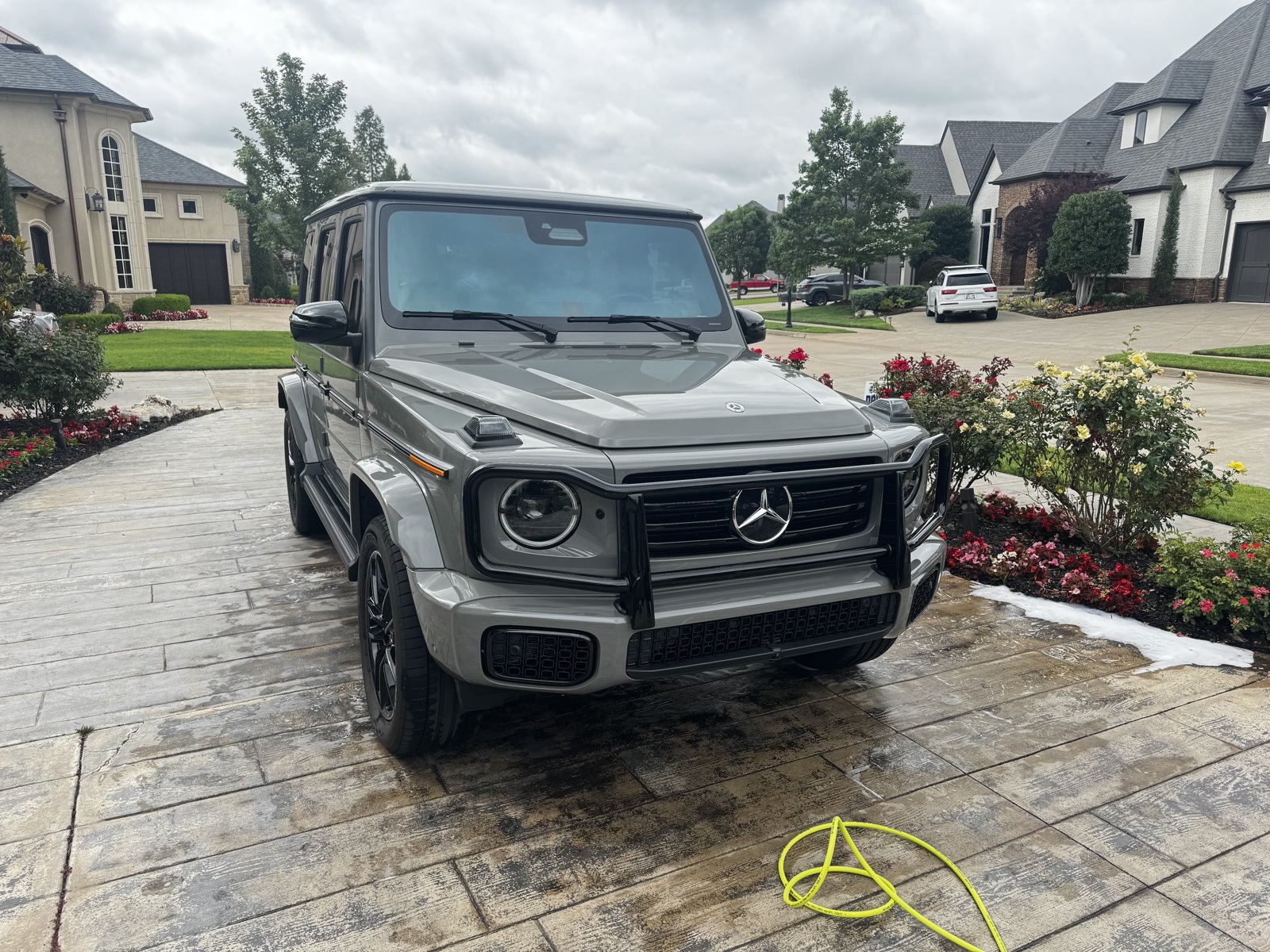 Mercedes-Benz G-Class after a hand wash on a stone driveway