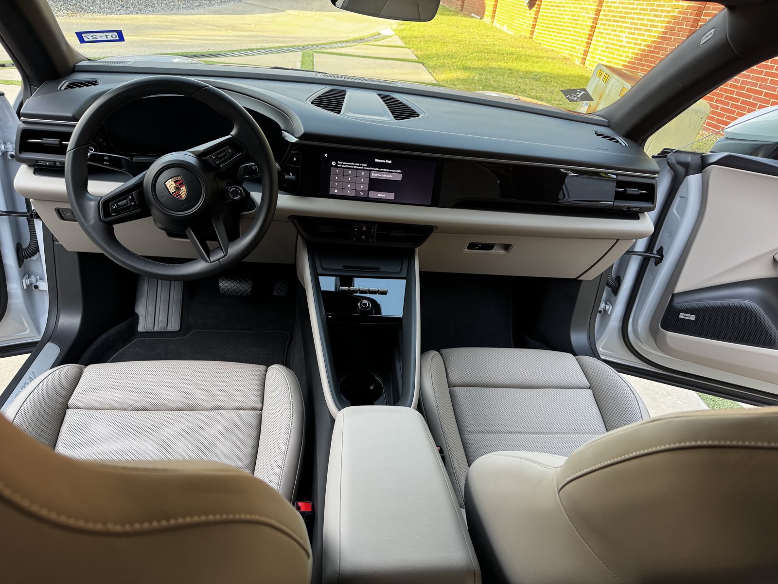 Porsche Macan interior with cream leather seats after detailing